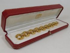 A fine quality heavy 18ct gold Cartier three tone, yellow, rose & white, gold bracelet with case 58.