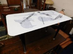 A 1960's retro formica coffee table with musical p