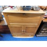 An Ercol Elm golden dawn colour cabinet with cupbo