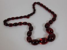 A set of antique red amber beads approx. 81.9g