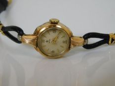 A ladies gold plated Tudor Rolex watch