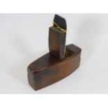 An antique coffin scraper plane