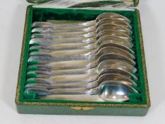 A cased set of French silver grapefruit spoons