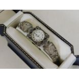 A boxed ladies silver watch set with marcasite