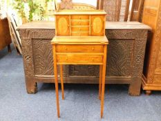 An elegant ladies writing desk with tapered legs