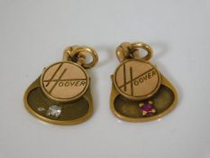 A Hoover company service award of gold pendants se