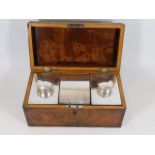 A 19thC. tea caddy with silver plated jars, faults