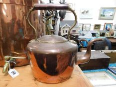 A Georgian copper kettle