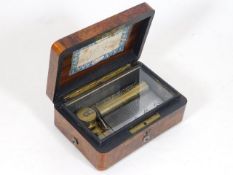 A compact 19thC. burr walnut music box
