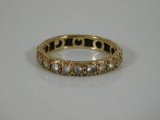A 9ct ring with white stones