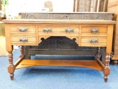 An Edwardian mahogany dresser base