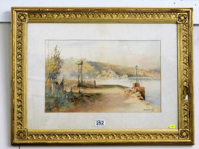 A gilt framed 1903 Rubens Southey riverside waterc