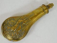 A 19thC. brass powder flask with game decor