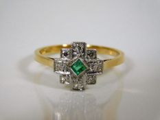 A good 1930's art deco ring set with diamonds & em