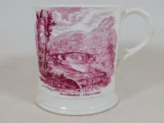 A large 19thC. Ironbridge Shropshire mug