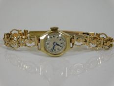 A ladies 9ct gold Swiss wrist watch