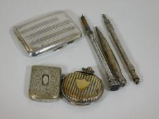 A silver cigarette case, two plated vestas & three