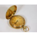 An 18ct full hunter gold pocket watch with gold co