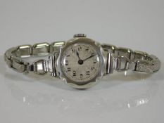 A ladies 1920's silver cased wrist watch