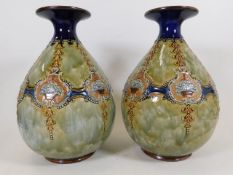 A good pair of Royal Doulton vases of bulbous wais