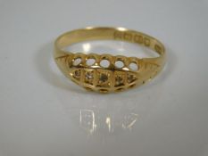 A small 18ct gold with diamond ring