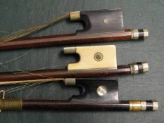 Three antique violin bows, one ivory