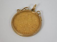 A 22ct gold mounted full sovereign