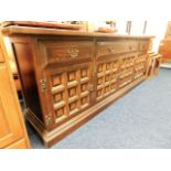 A large 1970's Younger oak sideboard with cupboard