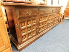 A large 1970's Younger oak sideboard with cupboard