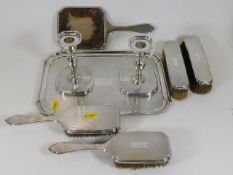 A silver art deco dressing table set, mirror & bru