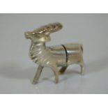 A silver plated menu holder in form of a stag