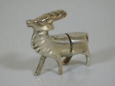 A silver plated menu holder in form of a stag
