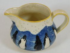 A rare Royal Doulton jug depicting penguins