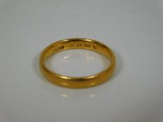 A 22ct gold band