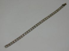 A 1930's art deco platinum & diamond line bracelet