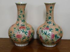 A large pair of early 20thC. Chinese vases featuri