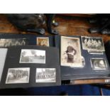 A boxed quantity of antique photo albums & scrap b