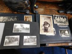 A boxed quantity of antique photo albums & scrap b