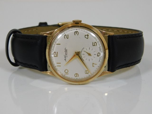 A 9ct gold gents Thomas Russell wrist watch inscri