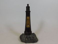 A 1920's Cornish serpentine lighthouse thermometer