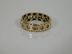 A 9ct gold ring, lacking one stone