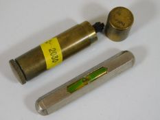 A trench art lighter twinned with small spirit lev