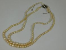 A double strand early 20thC. set of cultured pearl