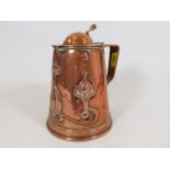 A c.1900 copper art nouveau lidded tankard