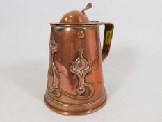 A c.1900 copper art nouveau lidded tankard