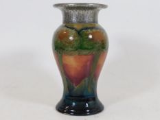 A Moorcroft Eventide vase with Liberty style pewte