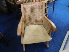 A 19thC. bergere style oak nursing chair