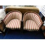 A pair of Edwardian Regency style bucket chairs