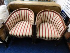 A pair of Edwardian Regency style bucket chairs