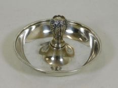A single silver candle holder